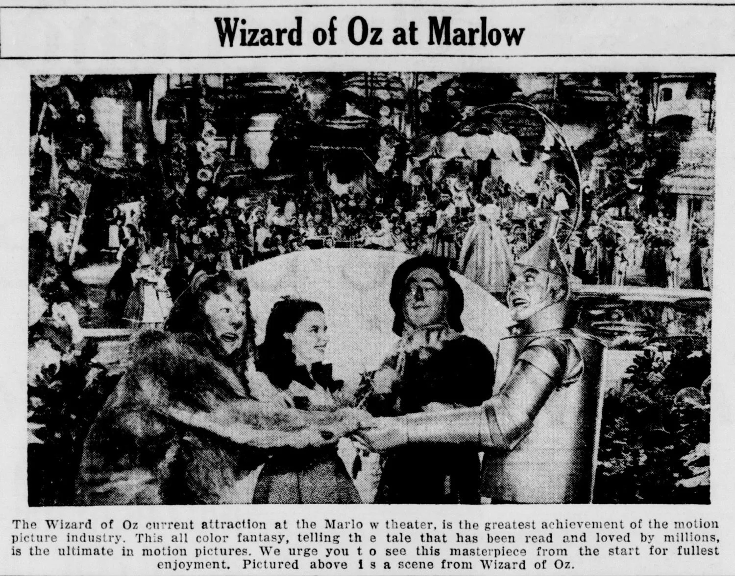 1939 newspaper advertisement for The Wizard of Oz showing a movie scene and promoting theater entertainment
