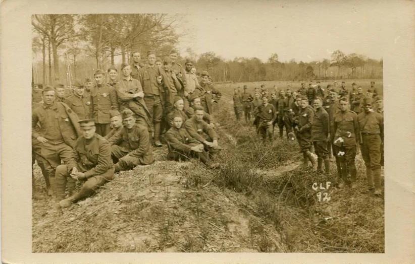 World War I photograph of 81st Infantry Division U.S. Army soldiers posing near a defensive mound in Europe