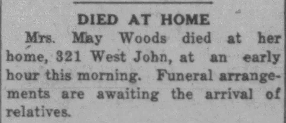 Newspaper death notice for Mrs. May Woods stating she died at home at 321 West John, with funeral arrangements pending.