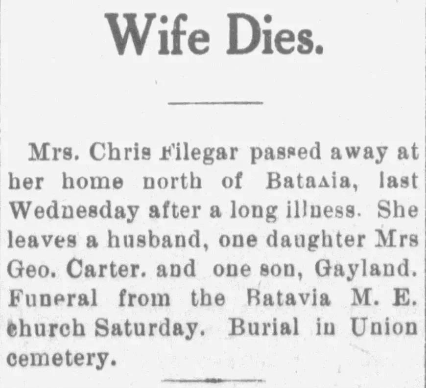 Newspaper notice titled “Wife Dies” for Mrs. Chris Filegar, listing her husband, daughter Mrs. Geo. Carter, son Gayland, funeral church, and burial in Union Cemetery.