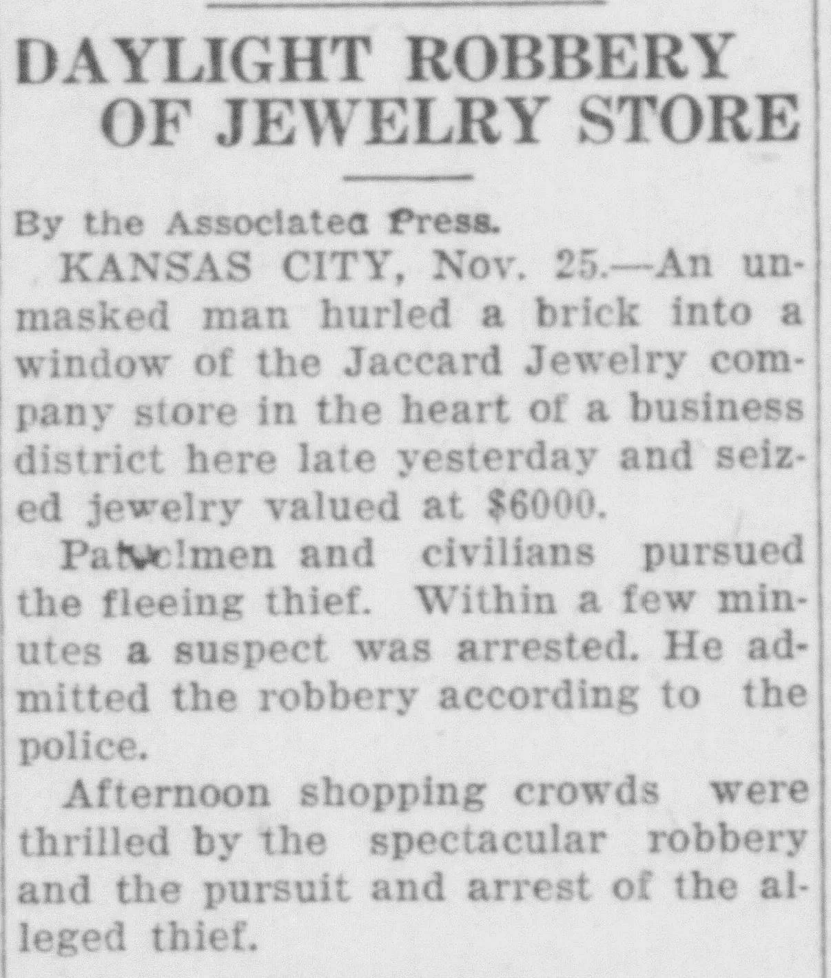 Historical newspaper clipping from the Sedalia Democrat with the headline “Daylight Robbery of Jewelry Store,” reporting the Jaccard Jewelry Company robbery in Kansas City, Missouri.
