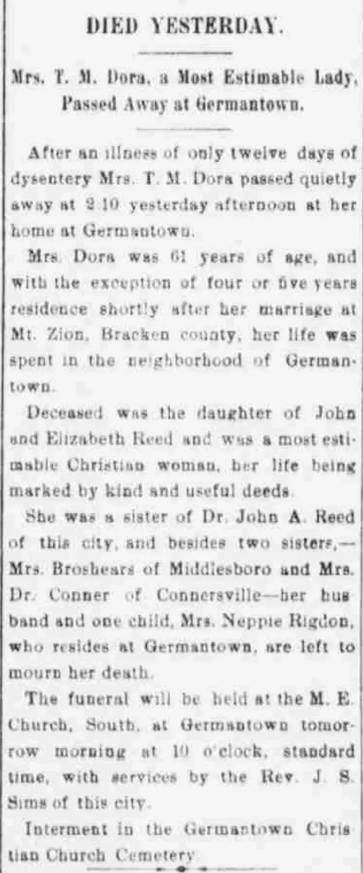 1898 Kentucky newspaper obituary for Mrs. F. M. Dora of Germantown, naming her parents John and Elizabeth Reed, siblings, husband, child, church, minister, and burial place.