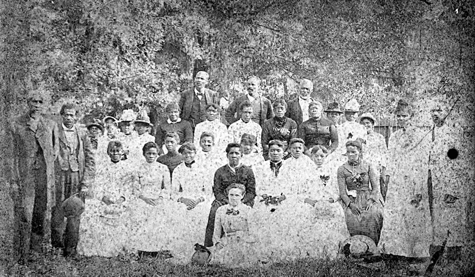 Group photograph taken at a Juneteenth celebration at Emancipation Park in Texas, 1880, showing a large gathering of African American men, women, and children dressed in formal attire