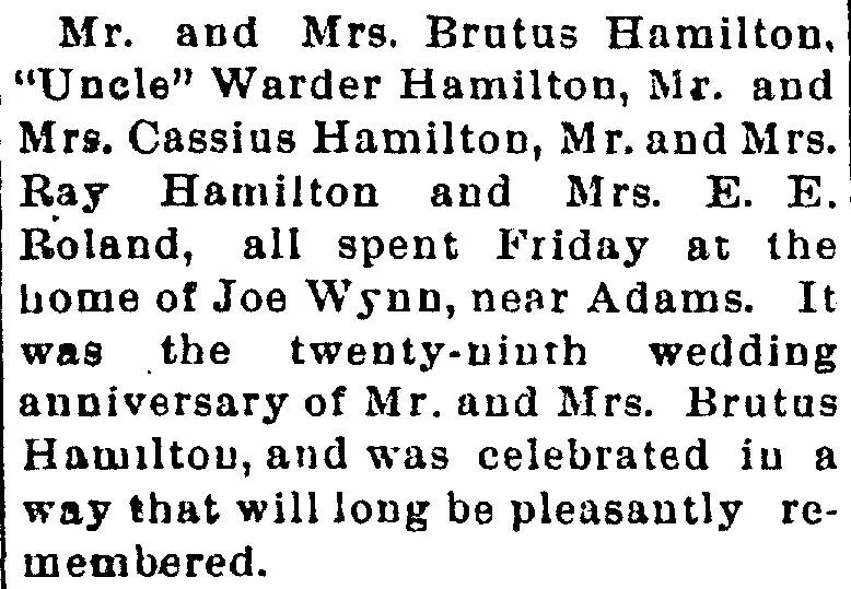 Social column item from the Greensburg Standard, December 1899, listing Warder Hamilton, Cassius Hamilton, Brutus Hamilton and their families gathered at a 29th wedding anniversary celebration for Mr. and Mrs. Brutus Hamilton near Adams, Indiana.