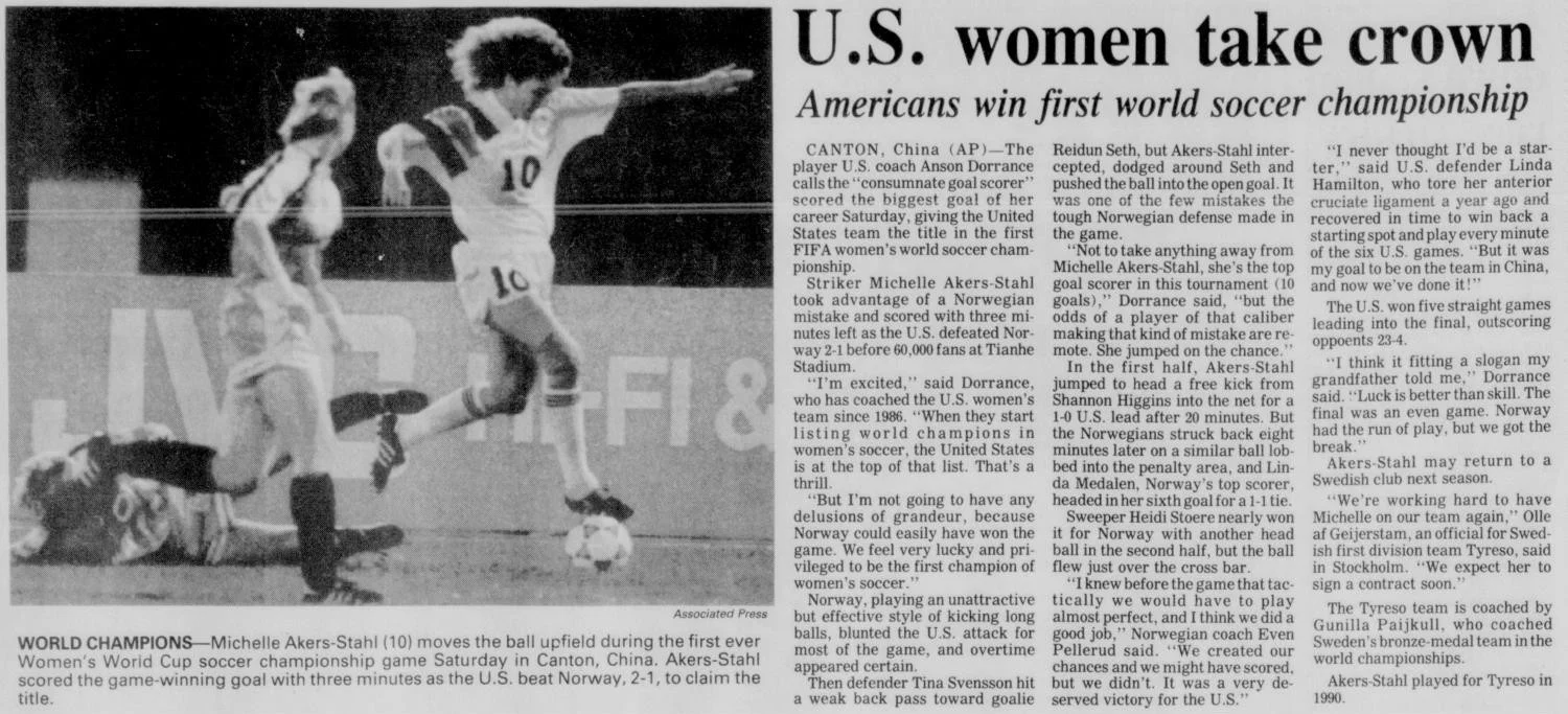 Newspaper clipping from the Fairbanks Daily News-Miner, December 1991, reporting the United States winning the first FIFA Women's World Cup in Canton, China, with Michelle Akers-Stahl scoring the winning goal